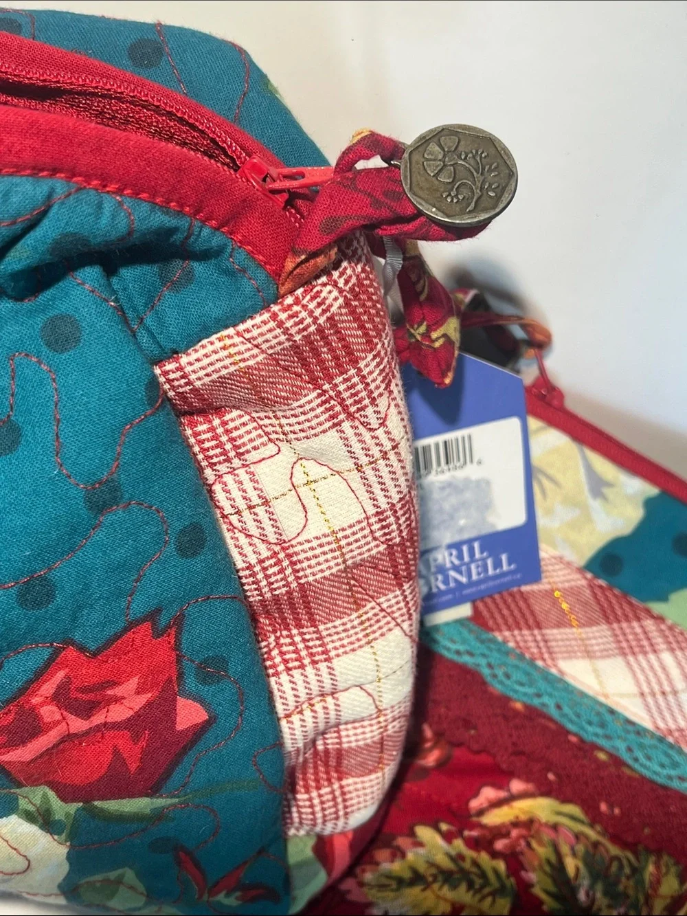 April Cornell Red Floral Quilted Cosmetic Crossbody with Teal Accents
